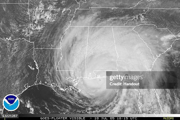 Hurricane Dennis is seen in this handout visible satellite image provided by NOAA July 10, 2005 over the US Gulf Coast. Dennis is now a Category 3...