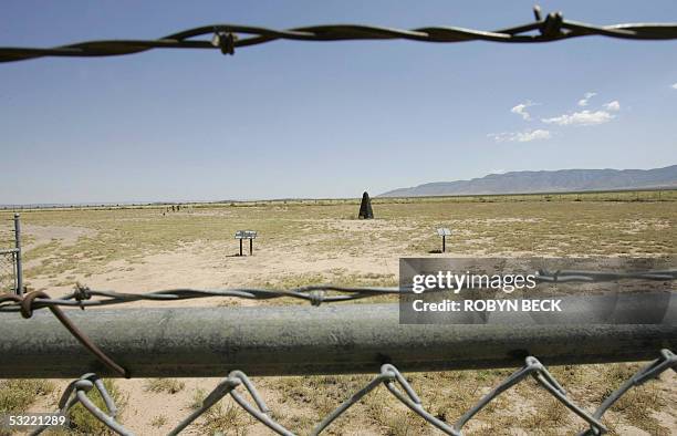 White Sands, UNITED STATES: TO GO WITH AFP STORY "WWII-HISTORY-JAPAN-US-NUCLEAR-BOMBS-TEST" BY MARC LAVINE A modest stone obelisk marks Trinity Site,...
