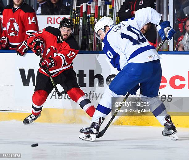 Marc-Andre Gragnani of the Albany Devils fires the puck past Stuart Percy of the Toronto Marlies during the Toronto Marlies 4-3 win in AHL playoff...