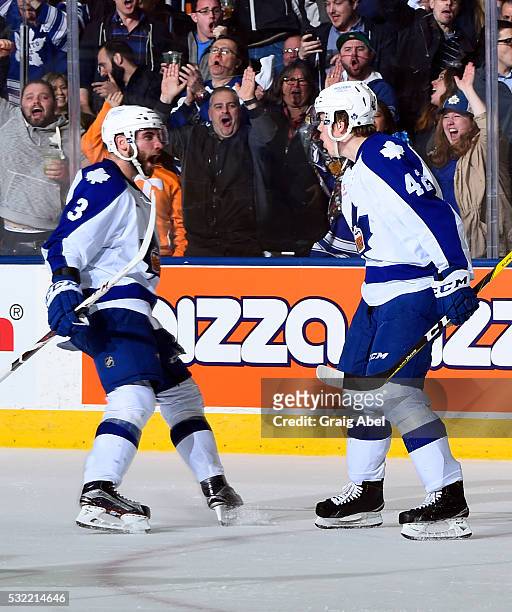 Brennan and Kasperi Kapanen of the Toronto Marlies celebrate a Marlie goal against the Albany Devils during the Toronto Marlies 4-3 win in AHL...