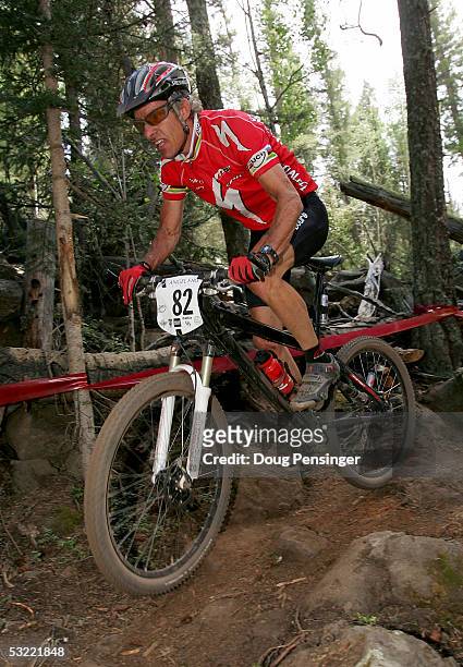 Ned Overend of the USA, at the age of 50, races to 18th place in the Men's Cross Country Race at the UCI Mountain Bike World Cup at the Angel Fire...