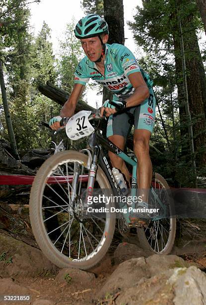 Kashi Leuchs of New Zealand races to fourth place in the Men's Cross Country Race at the UCI Mountain Bike World Cup at the Angel Fire Resort on July...