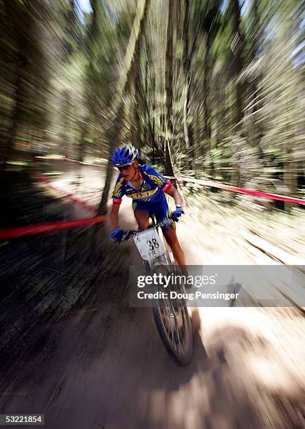 Katerina Hanusova of the Czech Republic races to 14th place in the Women's Cross Country Race at the UCI Mountain Bike World Cup at the Angel Fire...