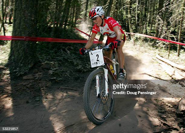 Marie Helene Premont of Canada races to second place in the Women's Cross Country Race at the UCI Mountain Bike World Cup at the Angel Fire Resort...