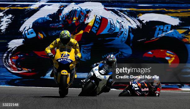 Troy Bayliss of Australia on his Honda Pons, Makoto Tamada of Japan on his Konica Minolta Honda and John Hopkins of the USA on his Red Bull Suzuki...