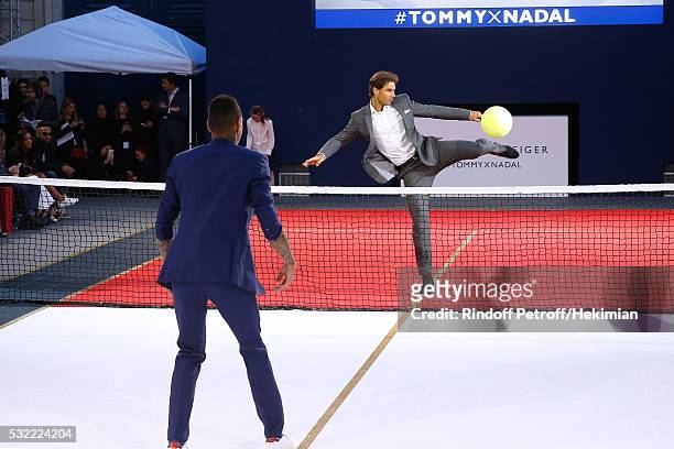Football player Gregory van der Wiel and Tennis player Rafael Nadal compete during Tommy Hilfiger hosts Tommy X Nadal Party - Tennis Soccer Match on...