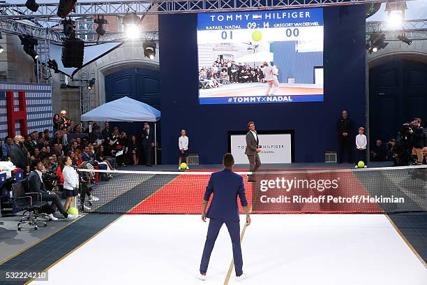 Football player Gregory van der Wiel and Tennis player Rafael Nadal compete during Tommy Hilfiger hosts Tommy X Nadal Party - Tennis Soccer Match on...