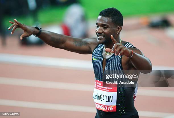 Justin Gatlin of the United States celebrates after win the Men's 100m during the Beijing IAAF World Challenge at National Stadium on May 18, 2016 in...