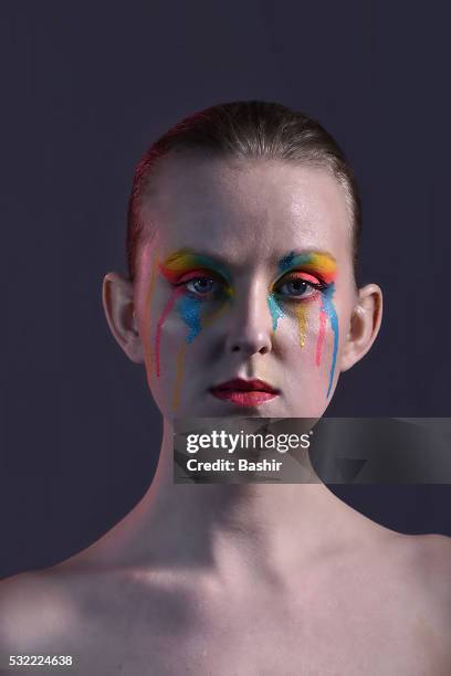 portrait of a woman with paint dripping from her eyes - ゲル効果 ストックフォトと画像