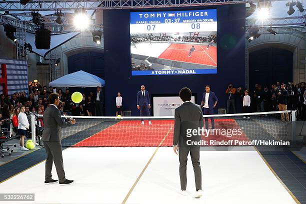 Model Andres Velencoso Segura and Tennis player Rafael Nadal compete against Football players Gregory van der Wiel and Jerome Alonzo during Tommy...