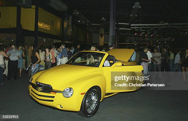 People mingle during the Stuff Magazine Technology XPO at the Detroit Science Center on July 10, 2005 in Detroit, Michigan.