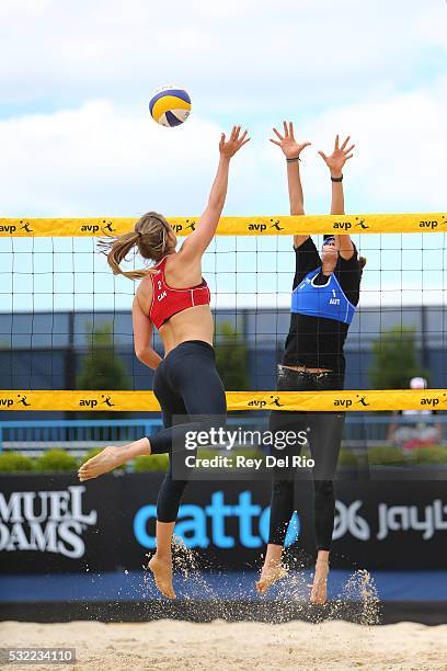 Taylor Pischke of Canada hits the ball over the net against Lena Plesiutschnig of Austria during day 2 of the 2016 AVP Cincinnati Open on May 18,...