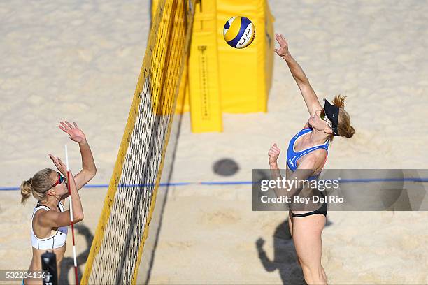 Kim Dicello of the USA sends the ball over the net against Kristina Valjas of Canada during day 2 of the 2016 AVP Cincinnati Open on May 18, 2016 at...