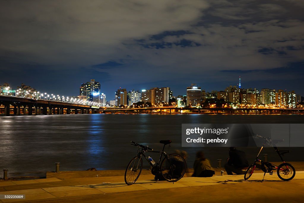 Bicycle and riverside night view