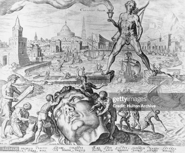 The Colossus Of Rhodes, one of the Seven Wonders of the Ancient World, straddles the harbour on the Greek island of Rhodes, circa 250 BC. The statue,...