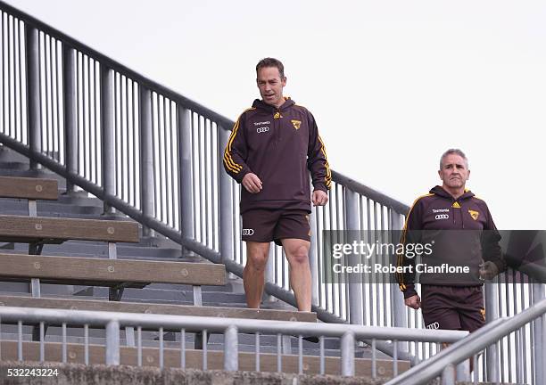 Hawks coach Alastair Clarkson and Chris Fagan, General Manager - Football Operations arrive during a Hawthorn Hawks AFL training session at Waverley...