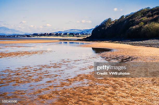 rippled sand and high tide, barrow in furness, cumbria - barrow in furness stock-fotos und bilder