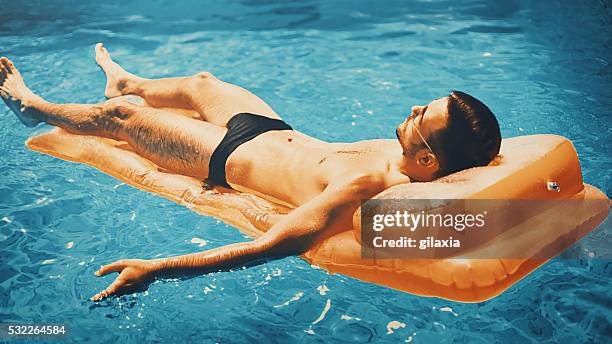 unavailable. - zwembroek stockfoto's en -beelden