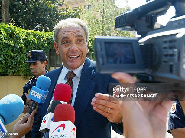 Italian Consul Franco Giordano talks to journalists near the Italian Cultural Institute after a small bomb exploded early 12 July 2005 outside the...