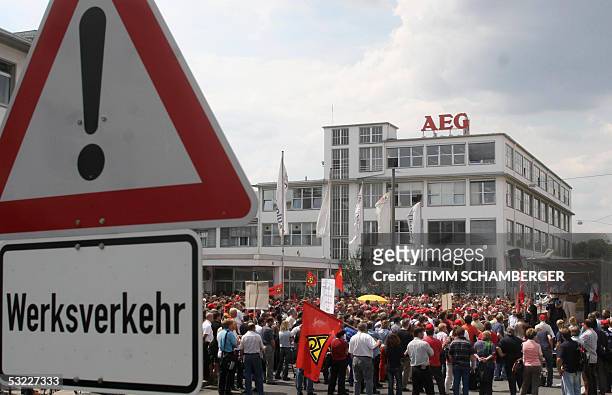 Employees of AEG, a brand of Swedish maker of electrical household appliances Electrolux, demonstrate on 12 July 2005 against the closing of their...