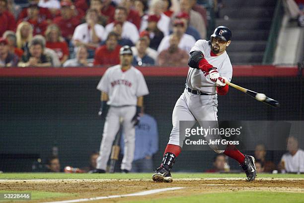 Catcher Jason Varitek of the Boston Red Sox takes a swing during the American League Division Series with the Anaheim Angels, Game Two on October 6,...