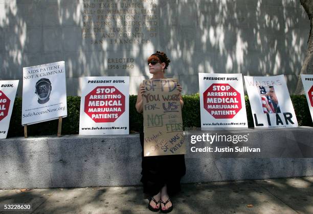 Becky DeKeuster holds a sign during a demonstration in front of the San Francisco Hall of Justice July 12, 2005 in San Francisco, California. A dozen...