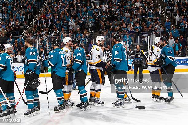 The San Jose Sharks shake hands with the Nashville Predators after the game in Game Seven of the Western Conference Semifinals during the 2016 NHL...