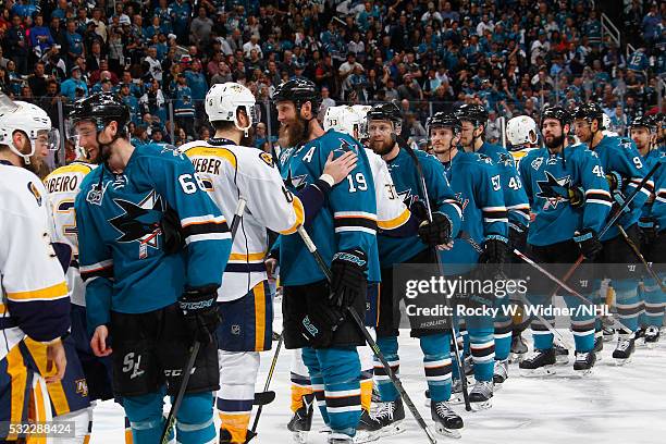 Joe Thornton of the San Jose Sharks shakes hands with Shea Weber of the Nashville Predators after the game in Game Seven of the Western Conference...