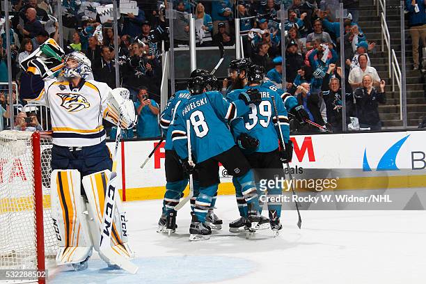 Joe Pavelski of the San Jose Sharks celebrates with teammates after scoring a goal against the Nashville Predators in Game Seven of the Western...