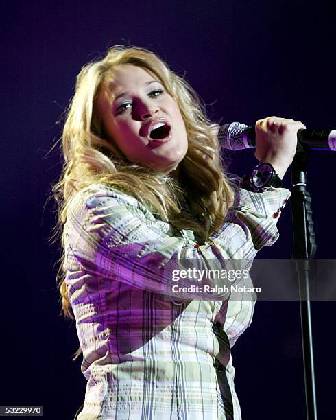 American Idol Winner Carrie Underwood performs during the American Idols Live tour opening show at the Office Depot Center on July 12, 2005 in...