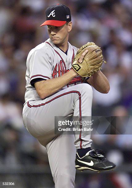 Starting pitcher Tom Glavine of the Atlanta Braves goes into his motion against the Arizona Diamondbacks during the first inning of Game 2 of the...