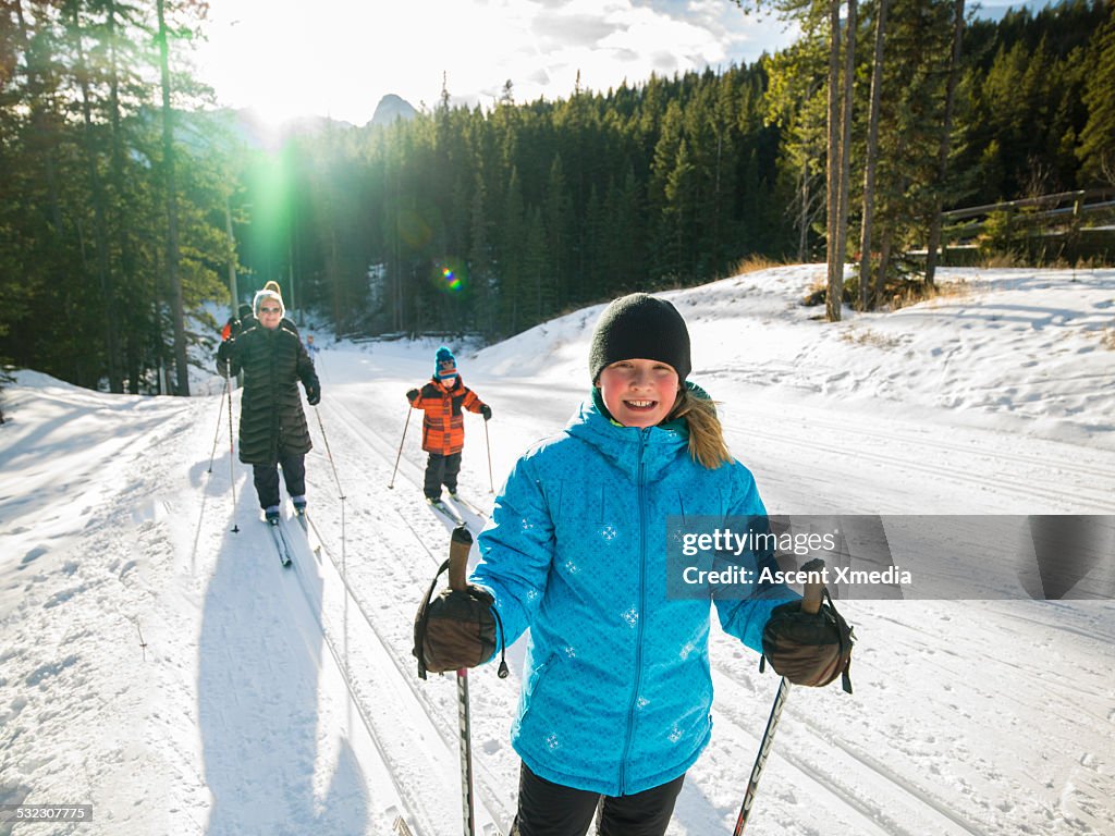 Portrait of x-country skiing family, nordic track