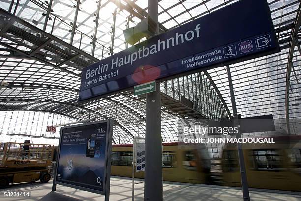 An S-Bahn train leaves Berlin's Lehrter Bahnhof railway station, still under construction in the capital's Mitte district 11 July 2005. The station,...