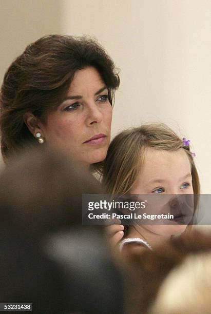 Princess Caroline of Hanover with Princess Alexandra attend a reception for Monegasque citizens hosted by His Serene Highness Prince Albert II on...