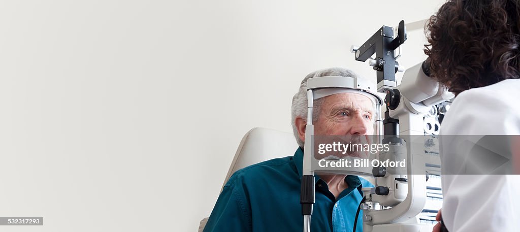 Optometrist with patient