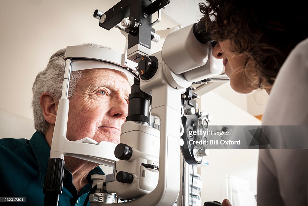 Optometrist with patient