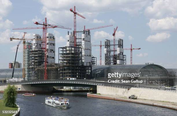 Cranes hover over Berlin's Lehrter Bahnhof railway station, under construction in the capital's Mitte district on July 13, 2005. The station,...