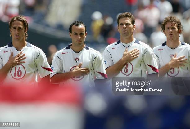 Josh Wolff#16, Landon Donovan, Greg Vanney, John O'Brien of the United States line up for the singing of the national anthem prior to the game...