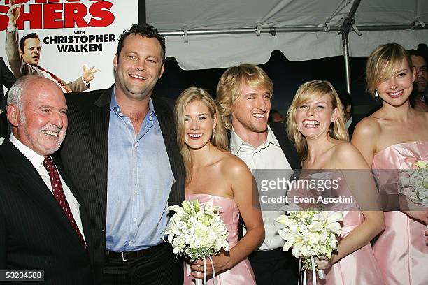 New Line Cinema Co-CEO Michael Lynne, actors Vince Vaughn and Owen Wilson pose with "bridesmaids" Heidi Bailey and Amelia Nelson at the premiere of...