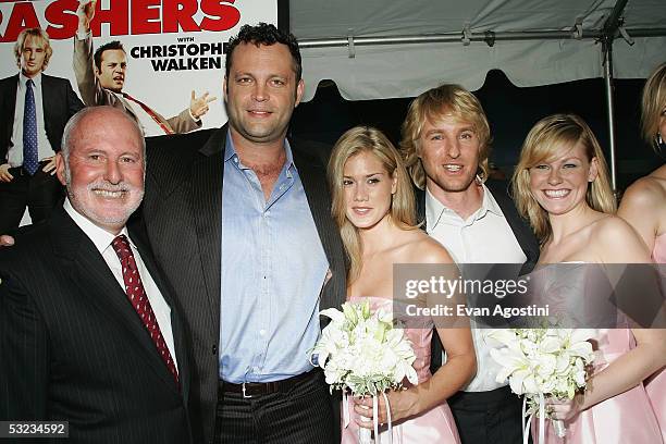 New Line Cinema Co-CEO Michael Lynne, actors Vince Vaughn and Owen Wilson pose with "bridesmaids" Heidi Bailey and Amelia Nelson at the premiere of...