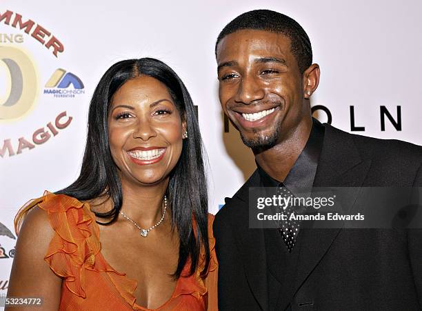 Cookie Johnson and son Andre Johnson arrive at the 20th Annual "Midsummer Night's Magic Awards Dinner" on July 13, 2005 at the Century Plaza Hotel in...