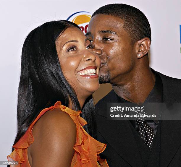 Cookie Johnson and son Andre Johnson arrive at the 20th Annual "Midsummer Night's Magic Awards Dinner" on July 13, 2005 at the Century Plaza Hotel in...