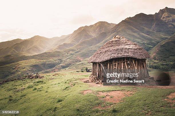 rural hut in lesotho - hut stock pictures, royalty-free photos & images