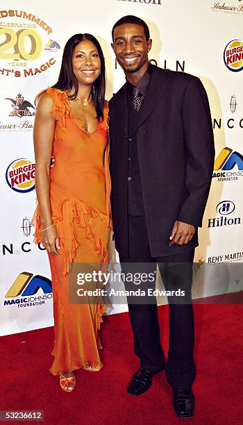 Cookie Johnson and son Andre arrive at the 20th Annual "Midsummer Night's Magic Awards Dinner" on July 13, 2005 at the Century Plaza Hotel in Los...