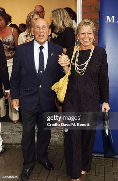 Stirling and Susie Moss attend an exhibition of Maserati Sports cars through the years hosted by Stephen Bayley at the Michael Hoppen Gallery on July...