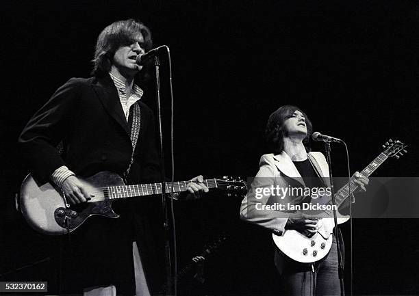 Ray Davies, Dave Davies of The Kinks performing on stage, London, United Kingdom, 1974.