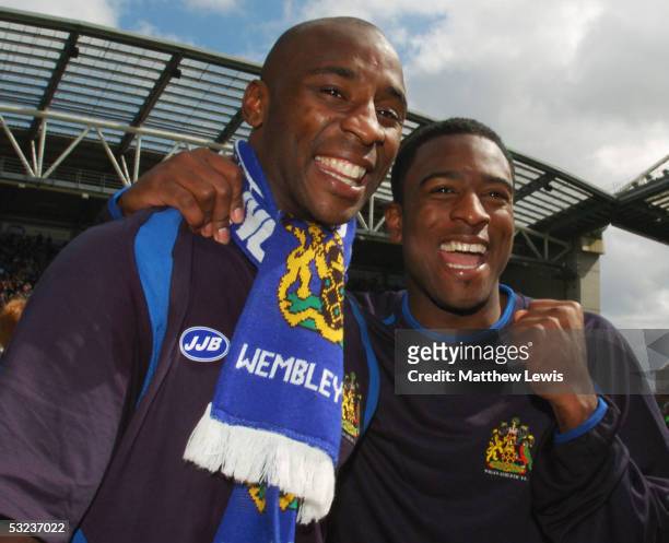 Jason Roberts and Nathan Ellington of Wigan Athletic celebrate promotion following the Coca-Cola Championship match between Wigan Athletic and...