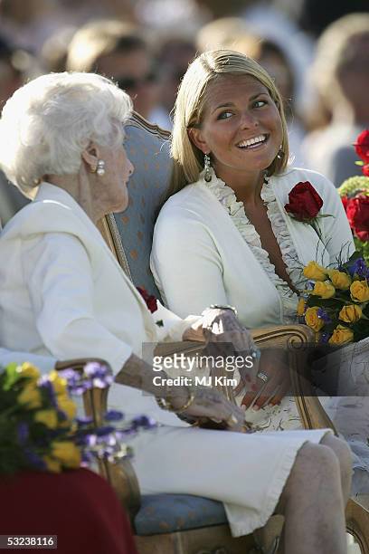 Princess Lilian and Princess Madeleine are seen at a concert during celebrations for Crown Princess Victoria's 28th birthday on July 14, 2005 in...