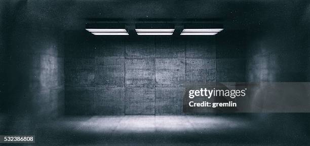 dark, spooky, empty office room - prison cell stockfoto's en -beelden