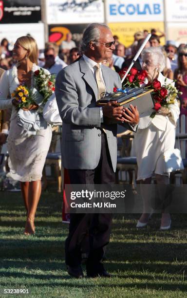 King Carl Gustav is seen at a concert during celebrations for Crown Princess Victoria's 28th birthday on July 14, 2005 in Borgholm, Sweden.